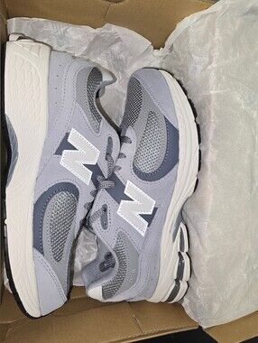 New Balance Light Gray and White Sneakers Women's Size 7 Kid's Size 6.